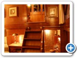 Steps from Pilot House into Salon. Steps down to the right lead to the aft Master Stateroom.