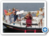 Weekly Duck Dodge sail boat race on Lake Union, tonight's theme: "Toga Night"